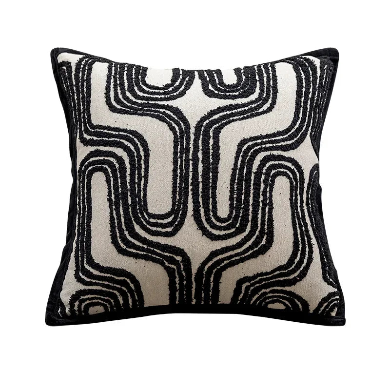 Housse de coussin blanc et noir
