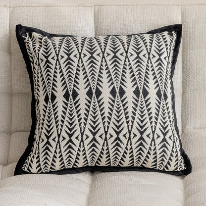 Housse de coussin blanc et noir