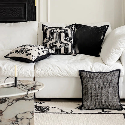 Housse de coussin blanc et noir